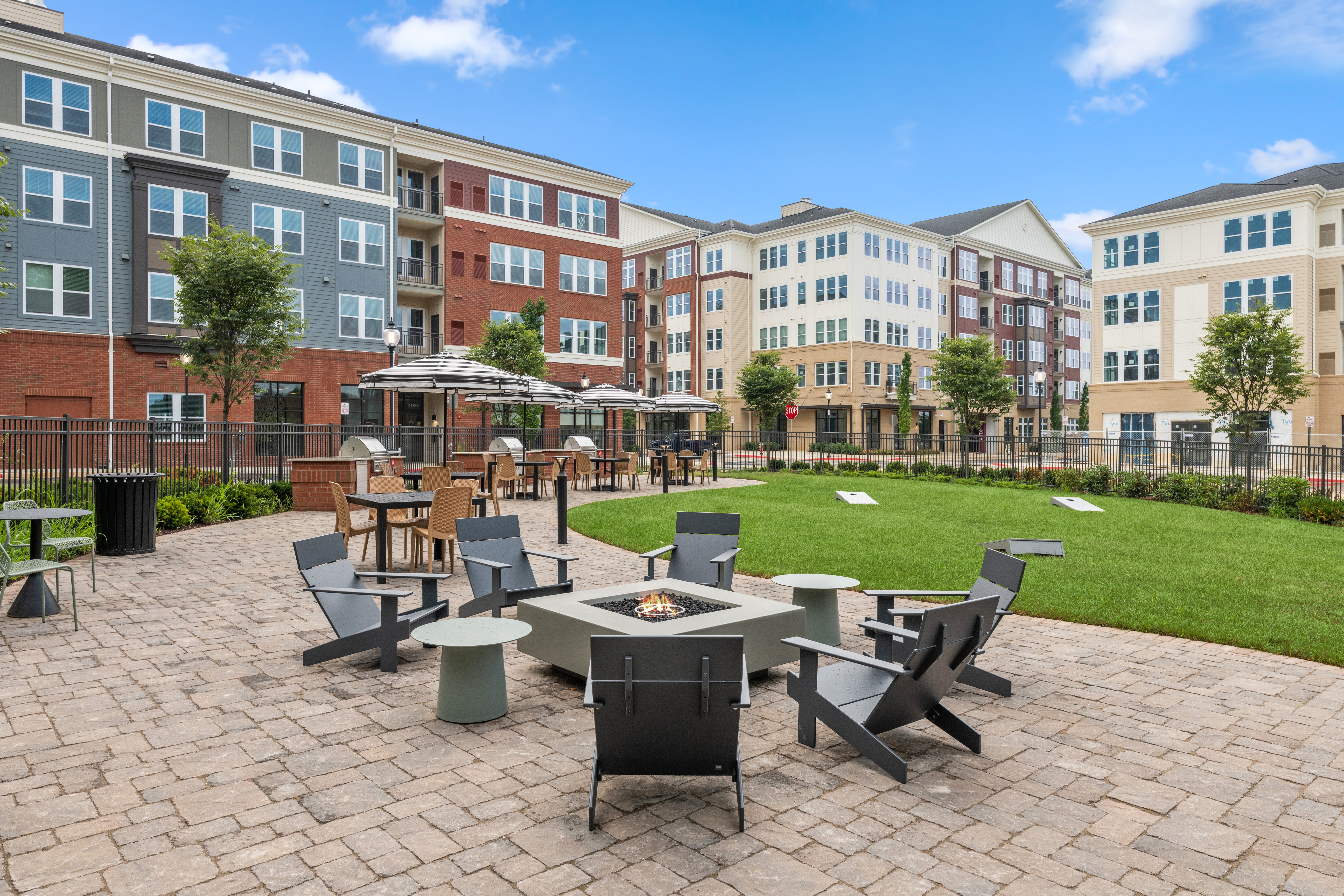 Courtyard with fire pit and lounge seating at The Point at Fairfax